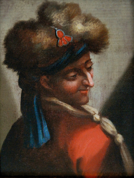 Глава на мъж с кожена шапка
